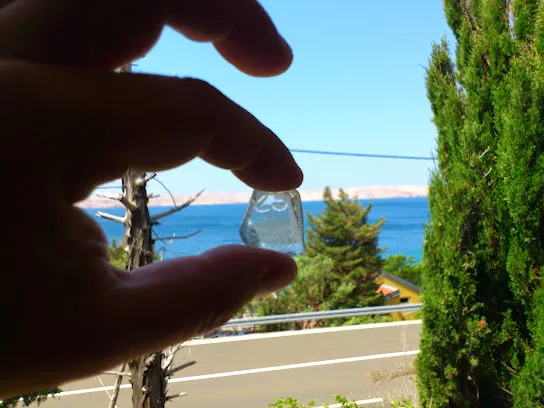 Balcony view via a glass I found in the sea. In my eyes sea sculptured a bike on it. Is that too much of a stretch of imagination?