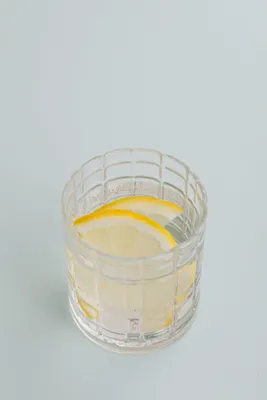 glass-of-cold-drink-with-lemon-4021993.jpg