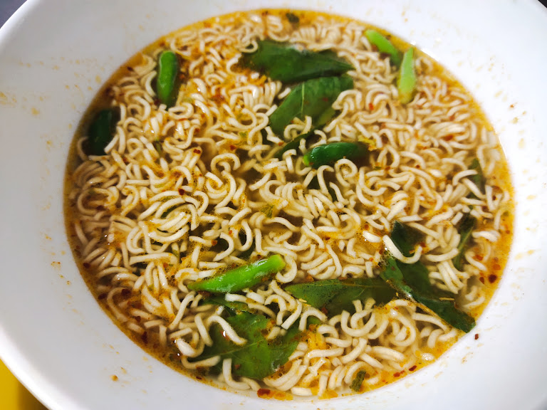 Lunch Menu: Omelette, incredibly delicious fried pork, supplemented with instant noodles.