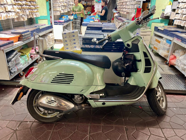 A Rare Find on the Streets of Bangkok: The Classic Scooter and Motorbike