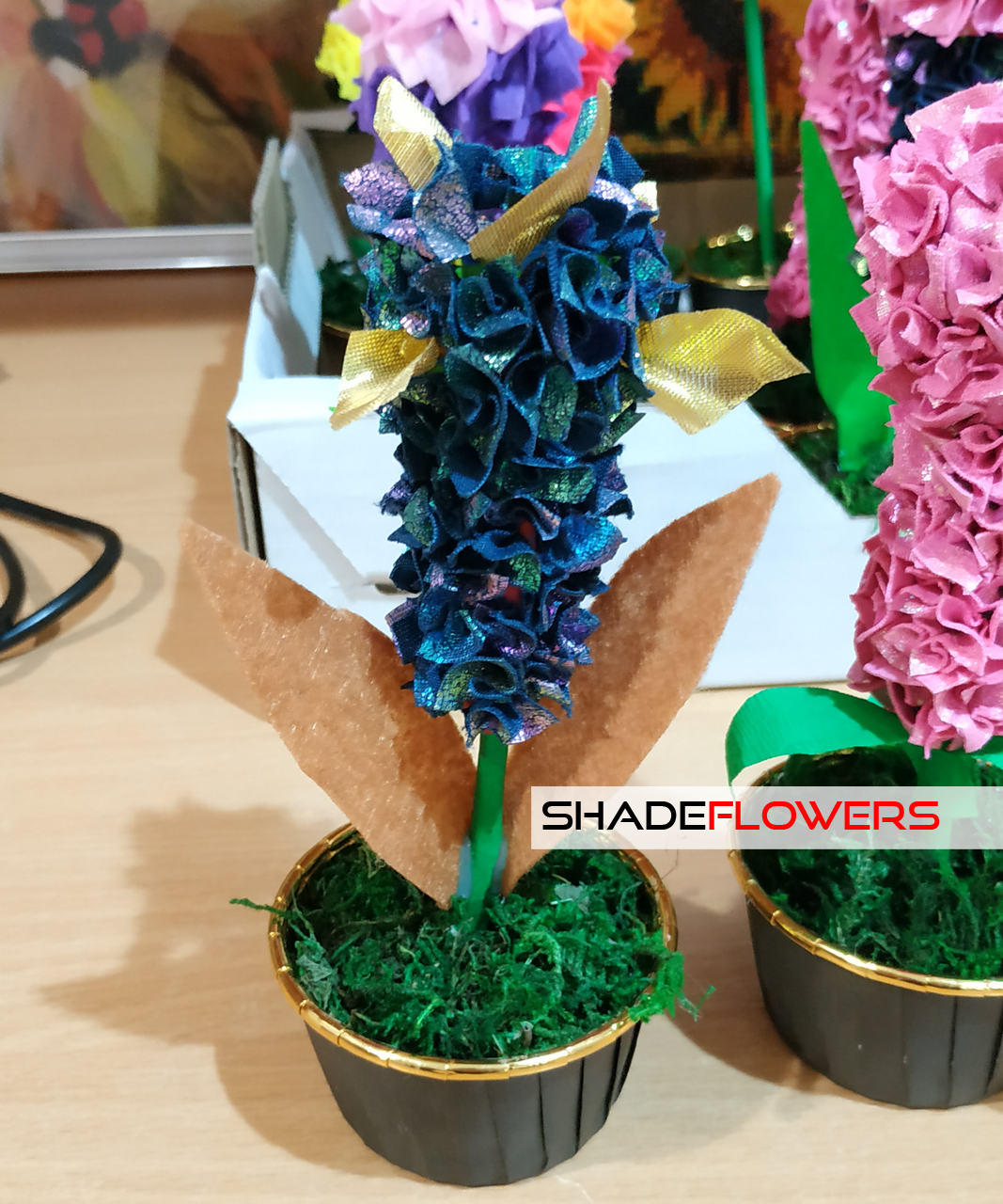 Flowers made of plasticine and fabric