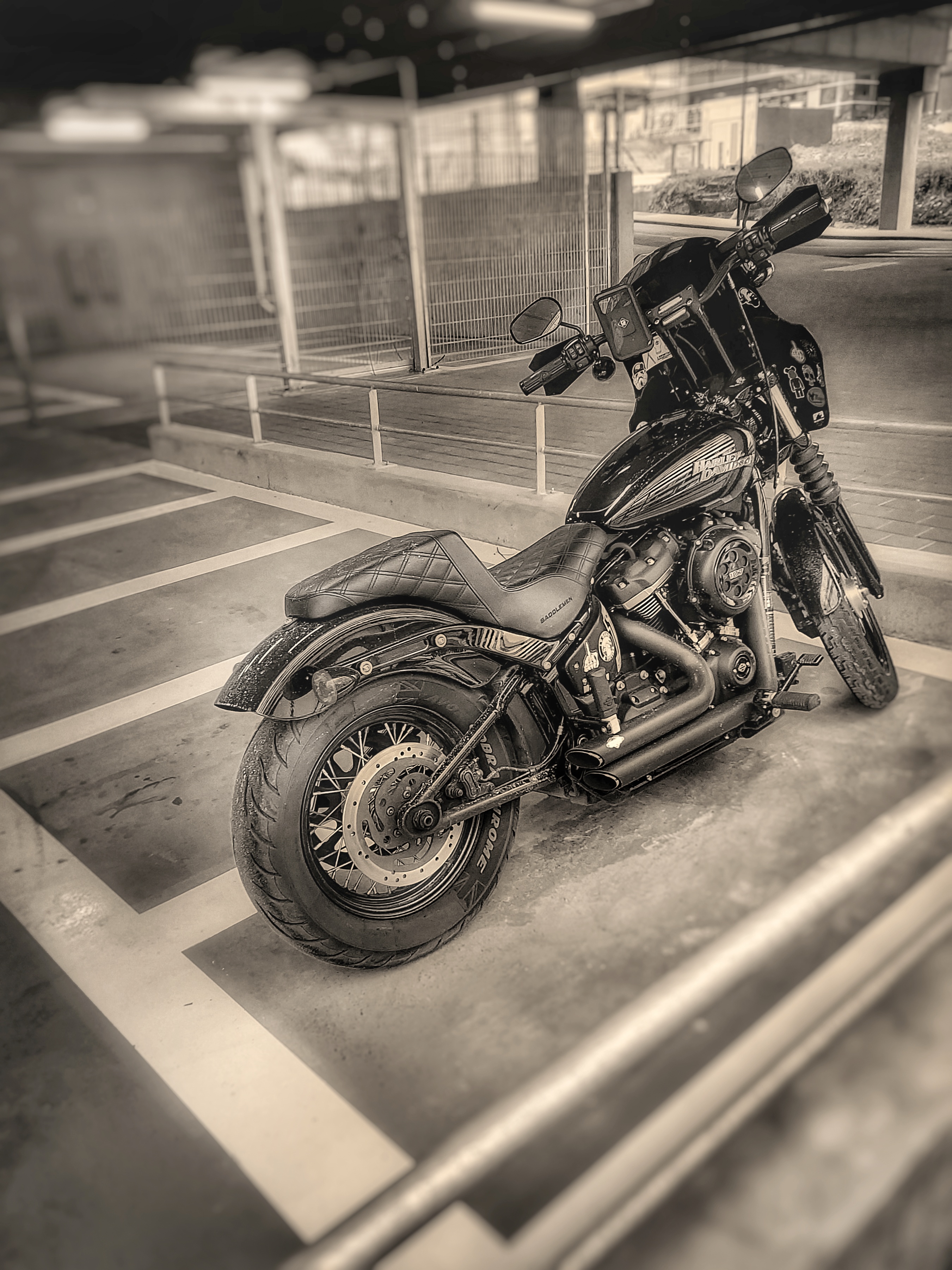 Harley Davidson motorcycle in black and white and in color