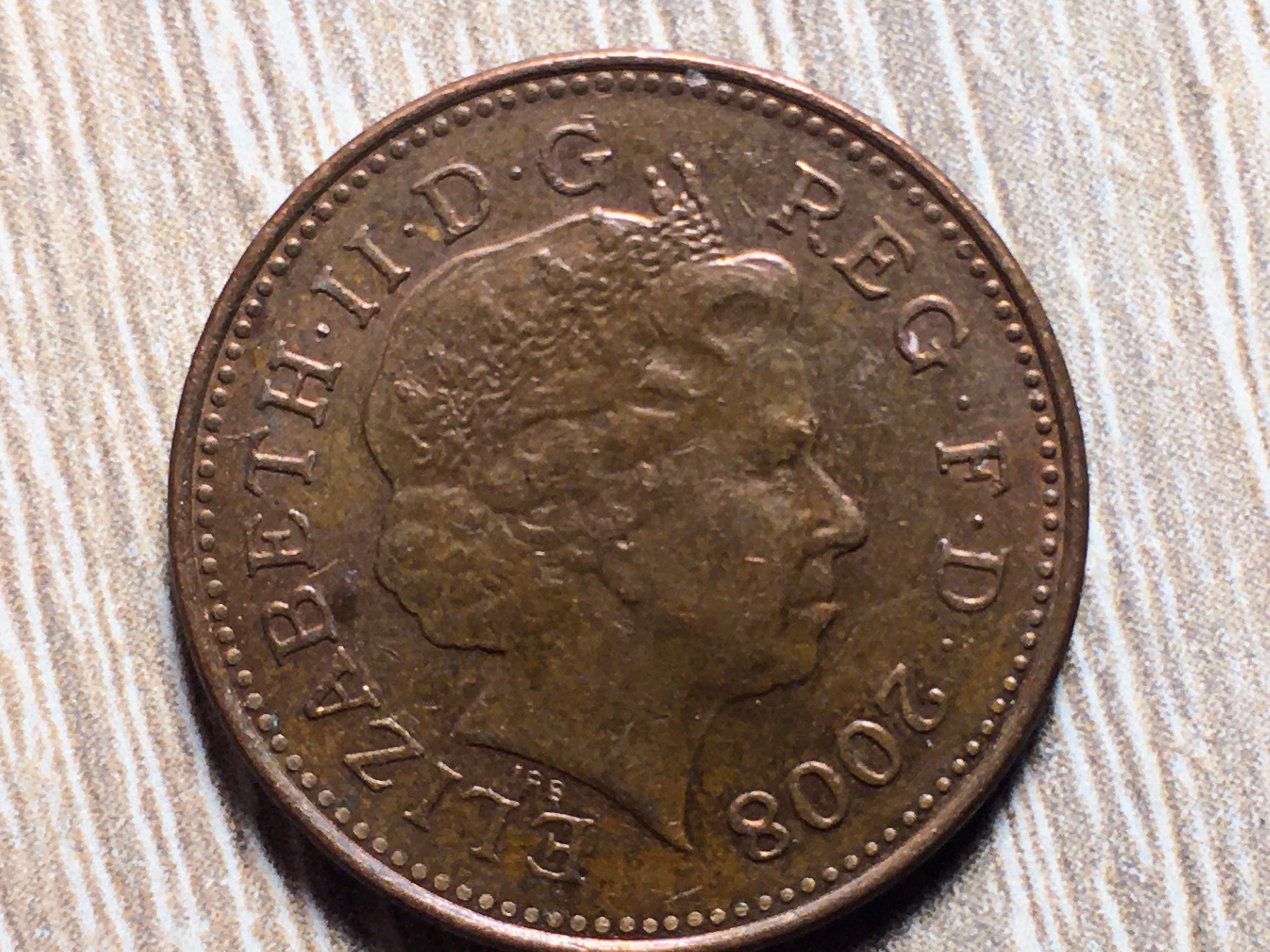 1 пенні: розмінна монета Великої Британії. 2008 рік. Про фунти, шилінги та пенси