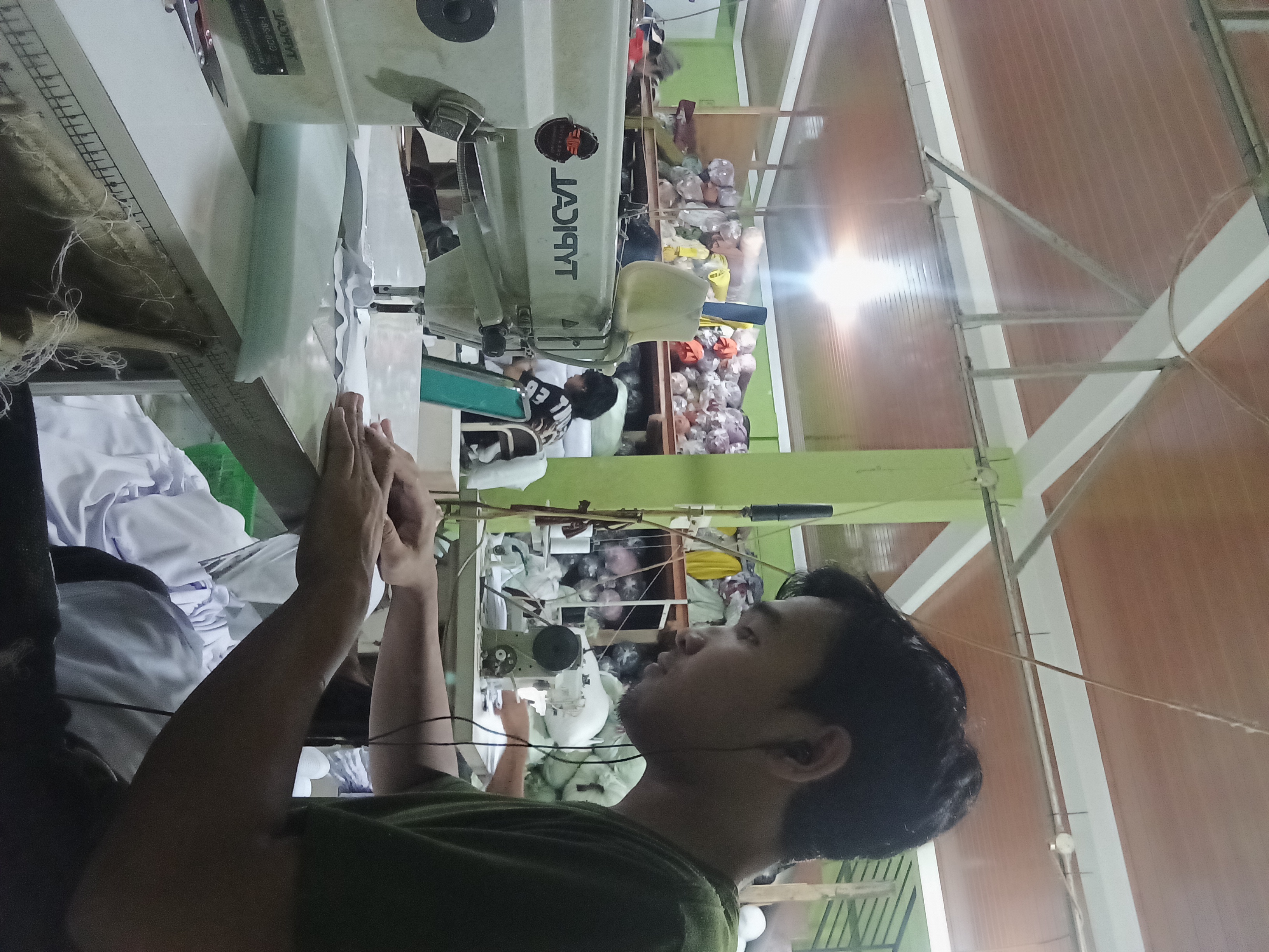 And this is me,busy sewing a headscarf.