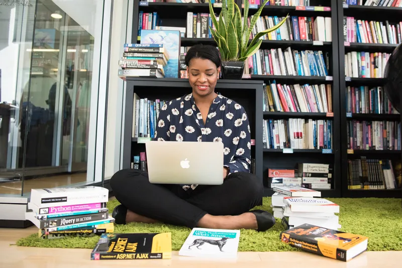 Canva  Woman in Black Shirt Using Macbook.jpg