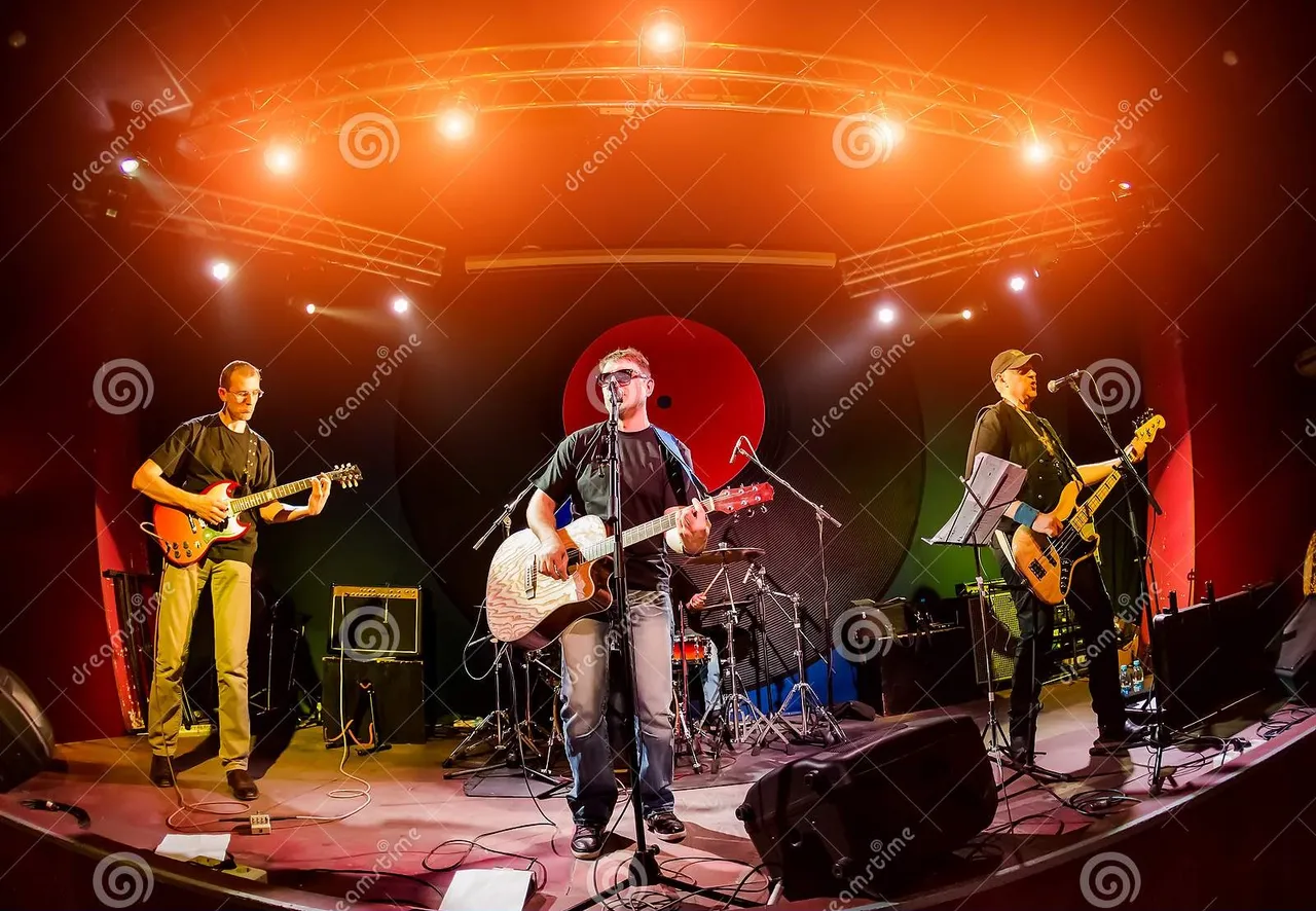 band_performs_stage_nightclub_rock_music_concert_authentic_shooting_high_iso_challenging_lighting_conditions_little_129422830.jpg