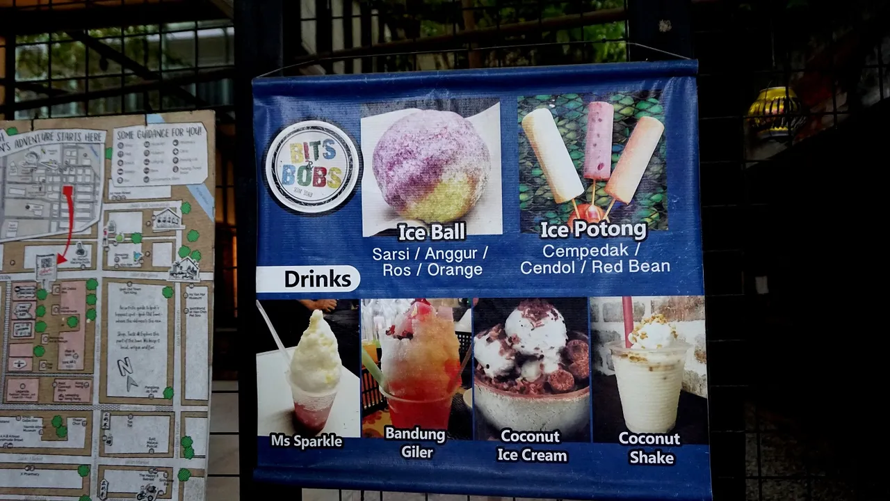 Bits and Bobs is a little shop with a counter you order from and it faces a small pebbled courtyard with some wooden benches you can sit and enjoy your treats! They insist/recommend you have your ice ball with 3-4 flavours - sarsi = sarsaparilla, anggur = grape, ros = rose and orange