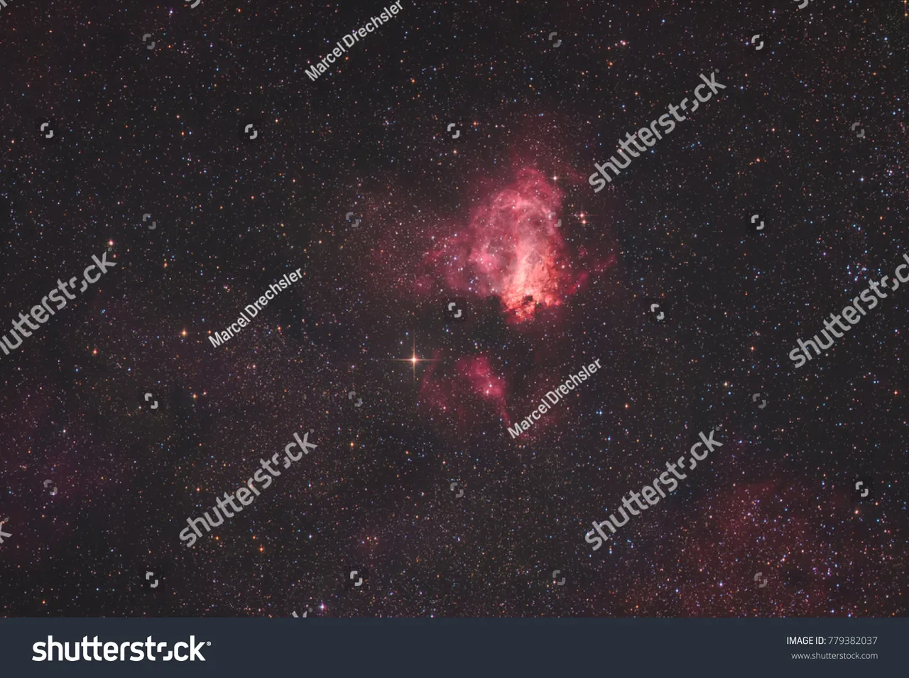 stock-photo--the-omega-nebula-also-known-as-the-swan-nebula-or-messier-779382037.jpg