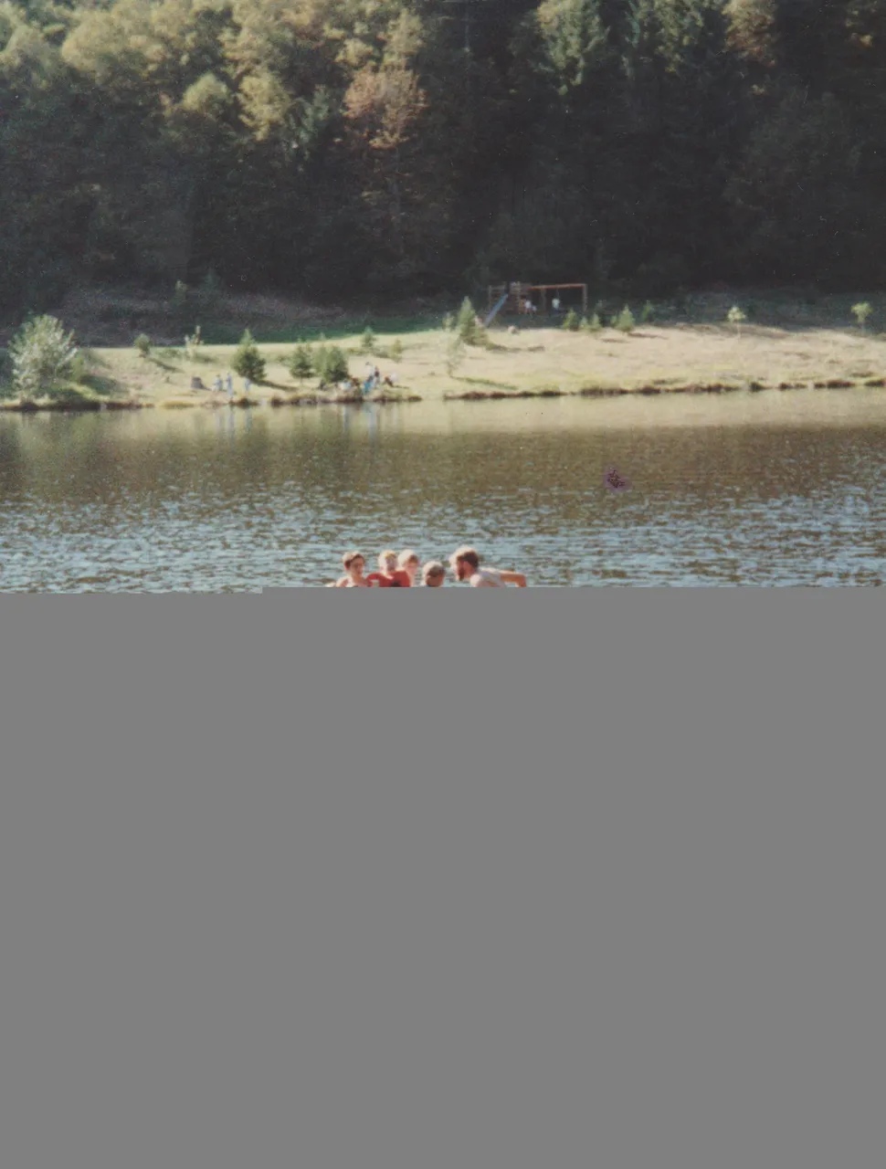 1980's maybe - Katie maybe - lake - kids - man - raft thing.jpg