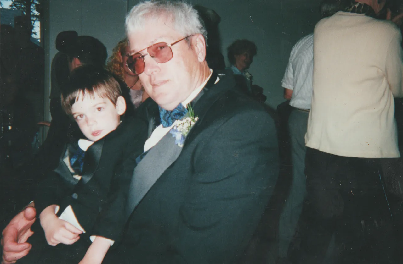 2000-07 - Jim Williams with grandson Tyler, the wedding of Nathan.png