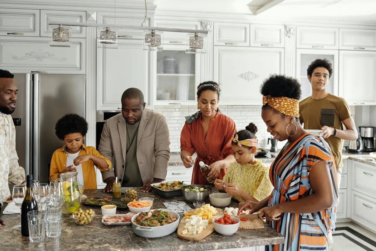 family-preparing-food-in-the-kitchen-4262010.jpg