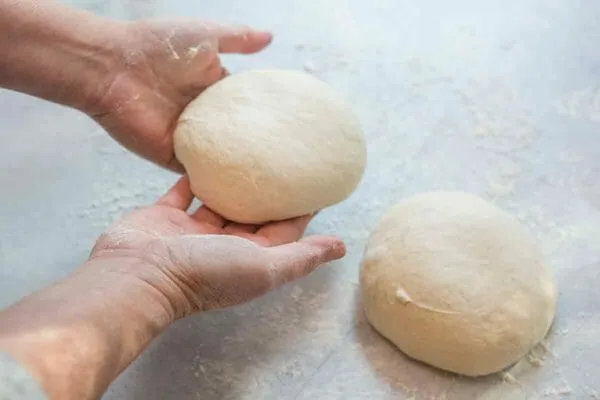 homemade-pizza-form-two-balls-dough-600x400.jpg