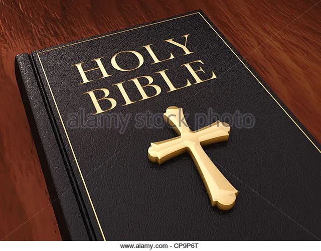 golden-cross-and-black-leather-bible-cp9p6t.jpg