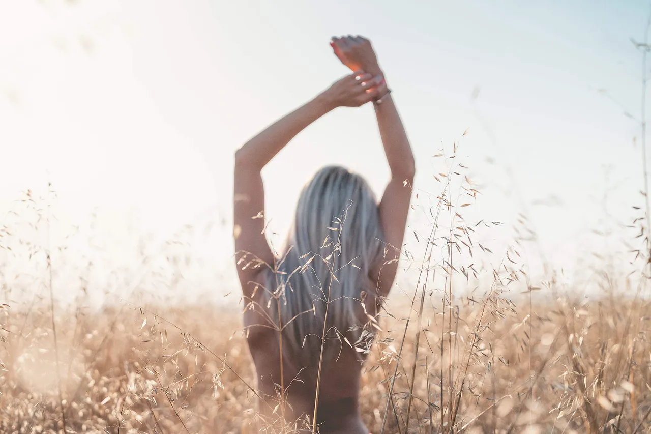 young-woman-enjoying-freedom-at-wheat-field_free_stock_photos_picjumbo_DSC00298-2-2210x1473.jpg