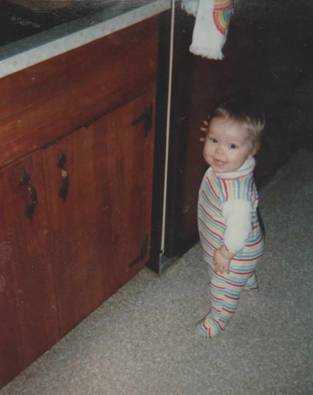 1981-05-17 - Sunday - Katie - Fridge - Standing - Almost 11 Months Old.png