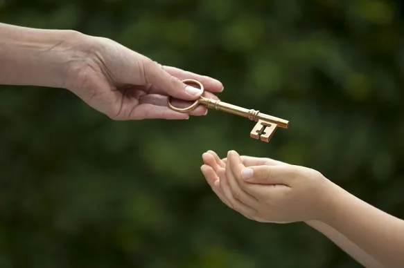 bigstock-Adult-Hands-Key-To-Child-44532022-583x388.jpg