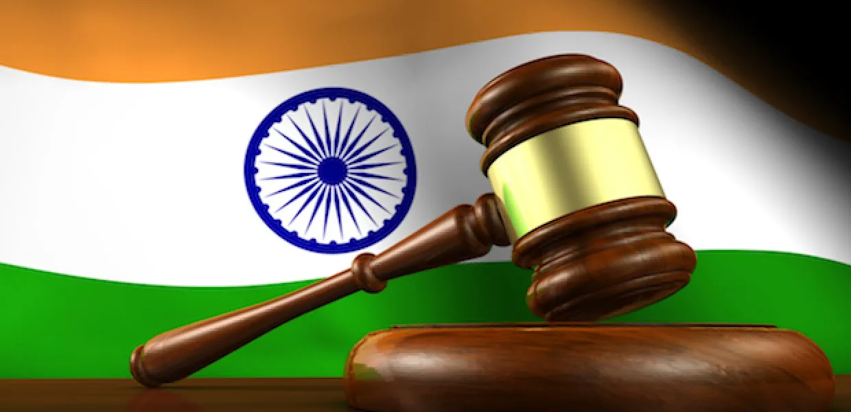 Indian_flag_and_gavel_05deced268540cad1e8b182b653fb636.jpg