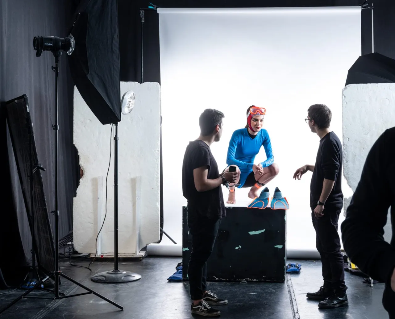 My interns talking with Constanza. Here you can see a part of the lighting setup for the shot.