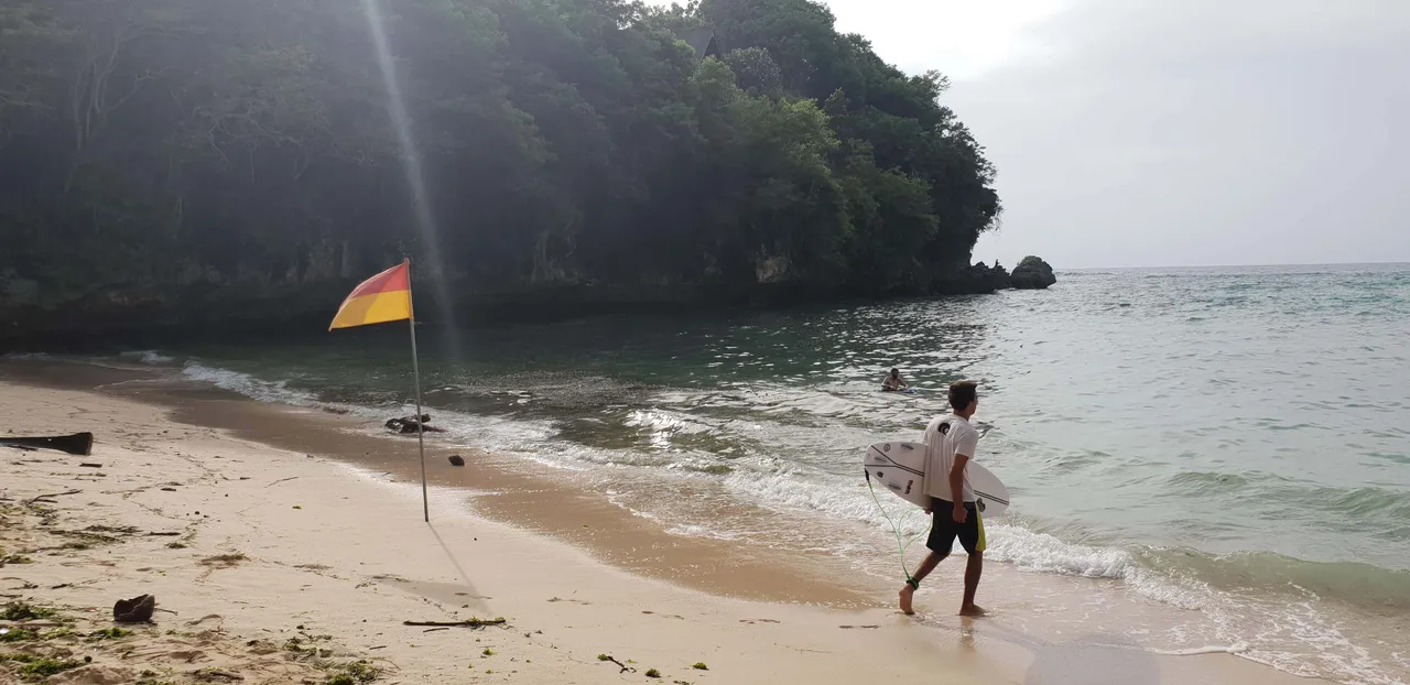 Surfing at the Padang Padang beach is an activity you can do in Uluwatu if you prefer adventure