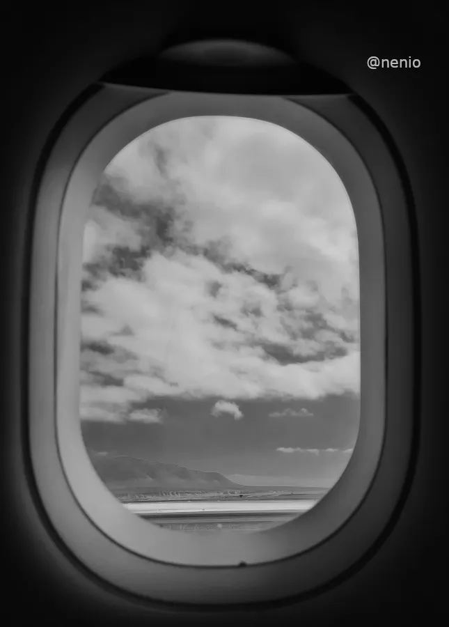 clouds-plane-window-01-bw.jpg