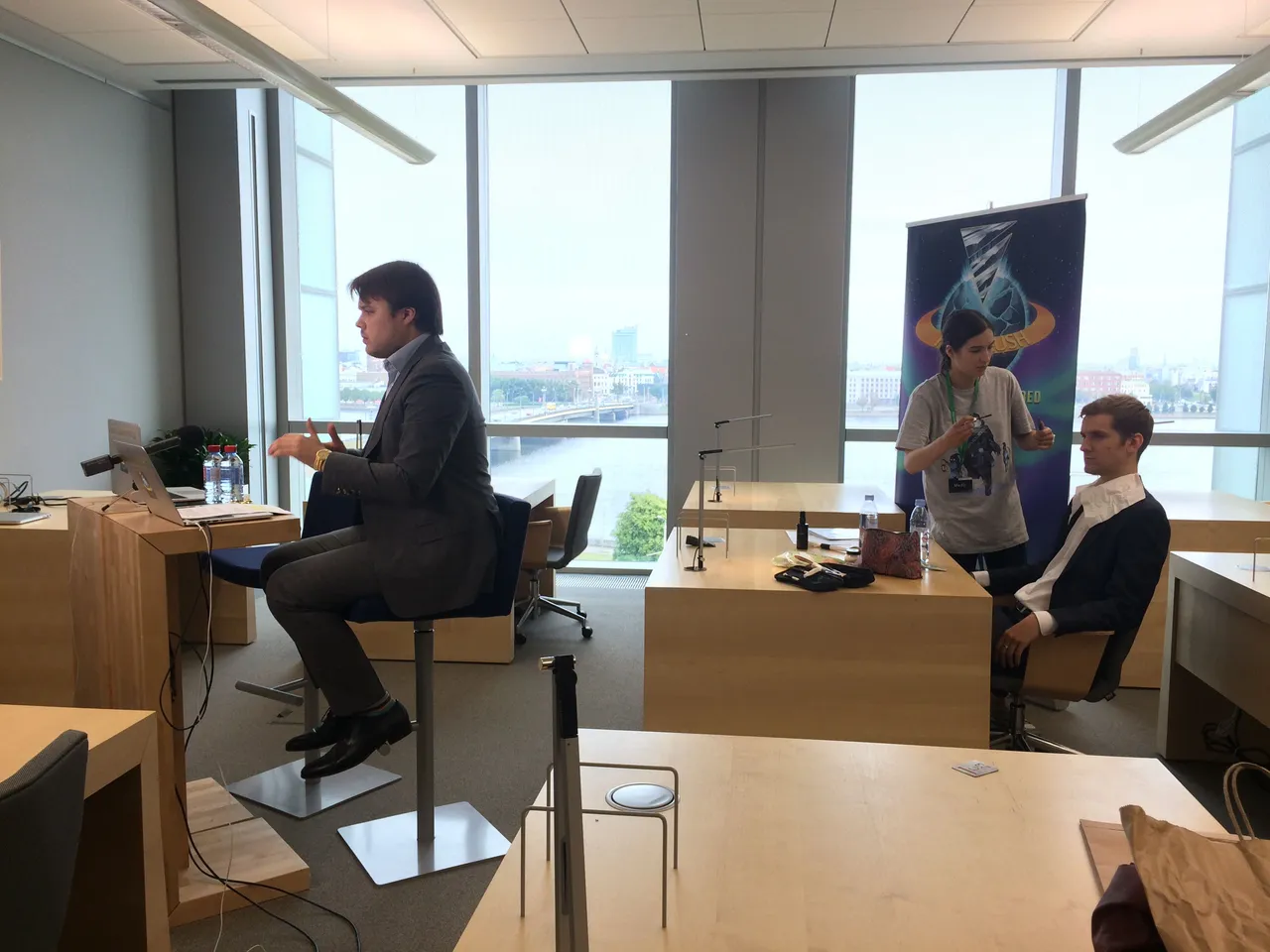 Kris and Nathan, preparing for their teleconference with Japanese investors
