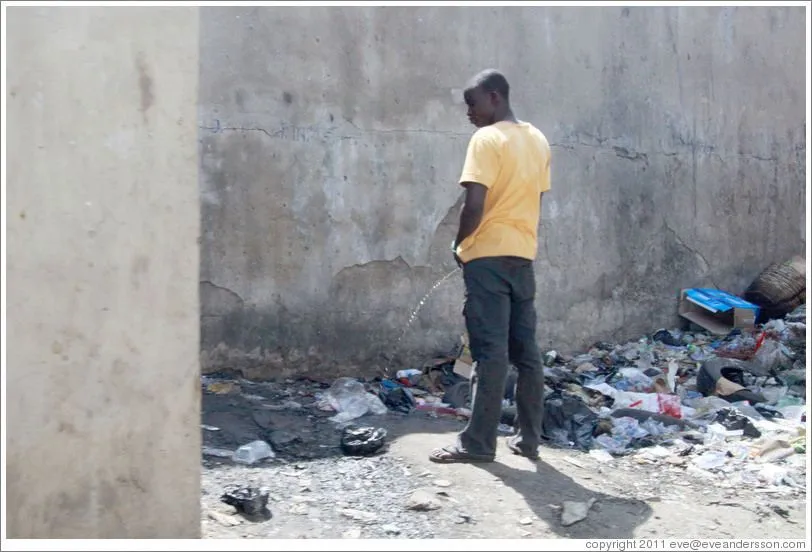 lagos-lagos-island-man-peeing-large.jpg