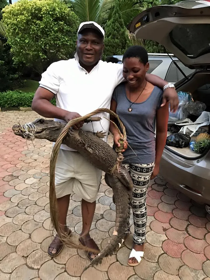 man-and-his-daughter-with-crocodile.jpg