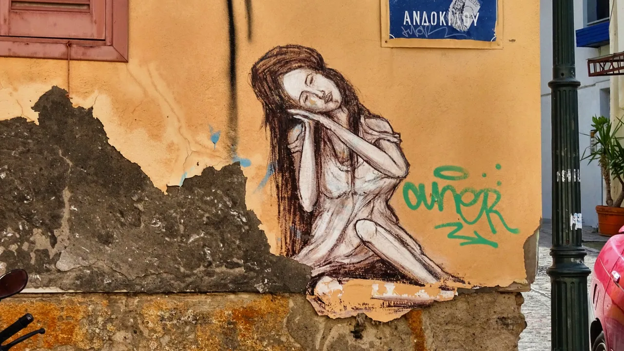 A sleeping girl on as wall