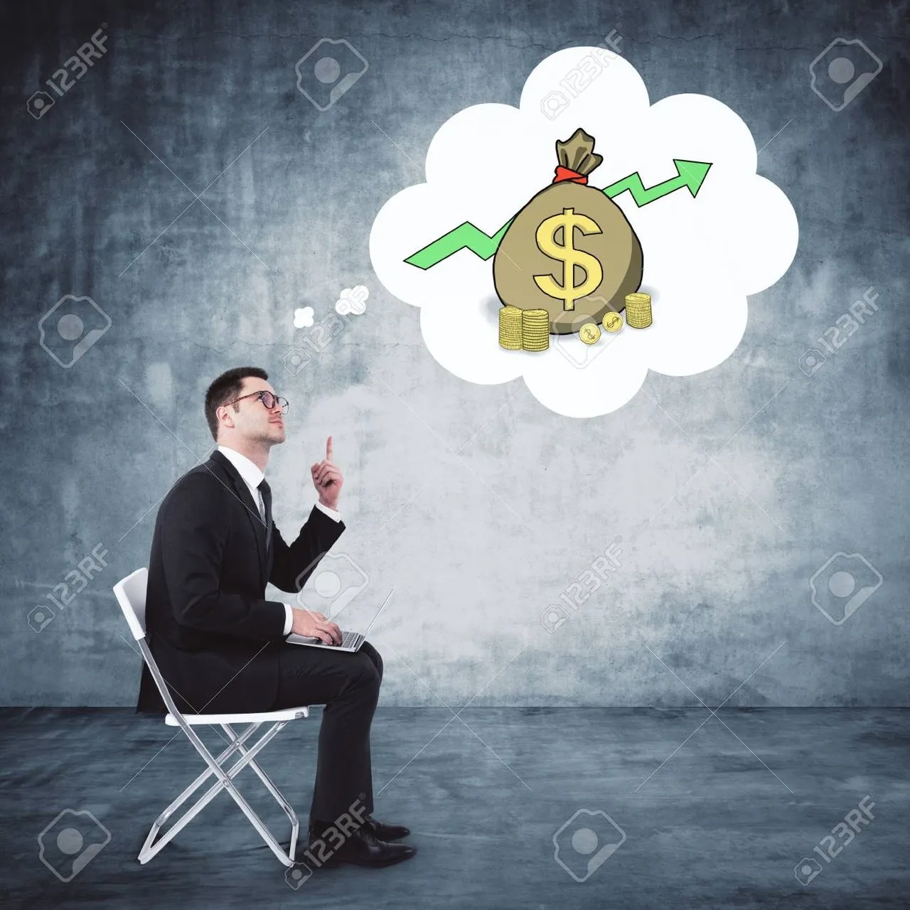 96184355handsomeeuropeanbusinessmanthinkingaboutmoneyinconcreteinteriorfinanceandbusinessconcept.jpg