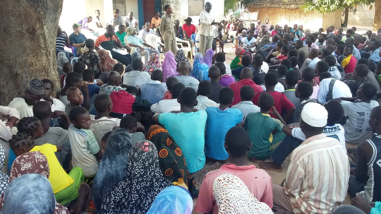 Village_meeting_to_discuss_matters_at_hand.jpg