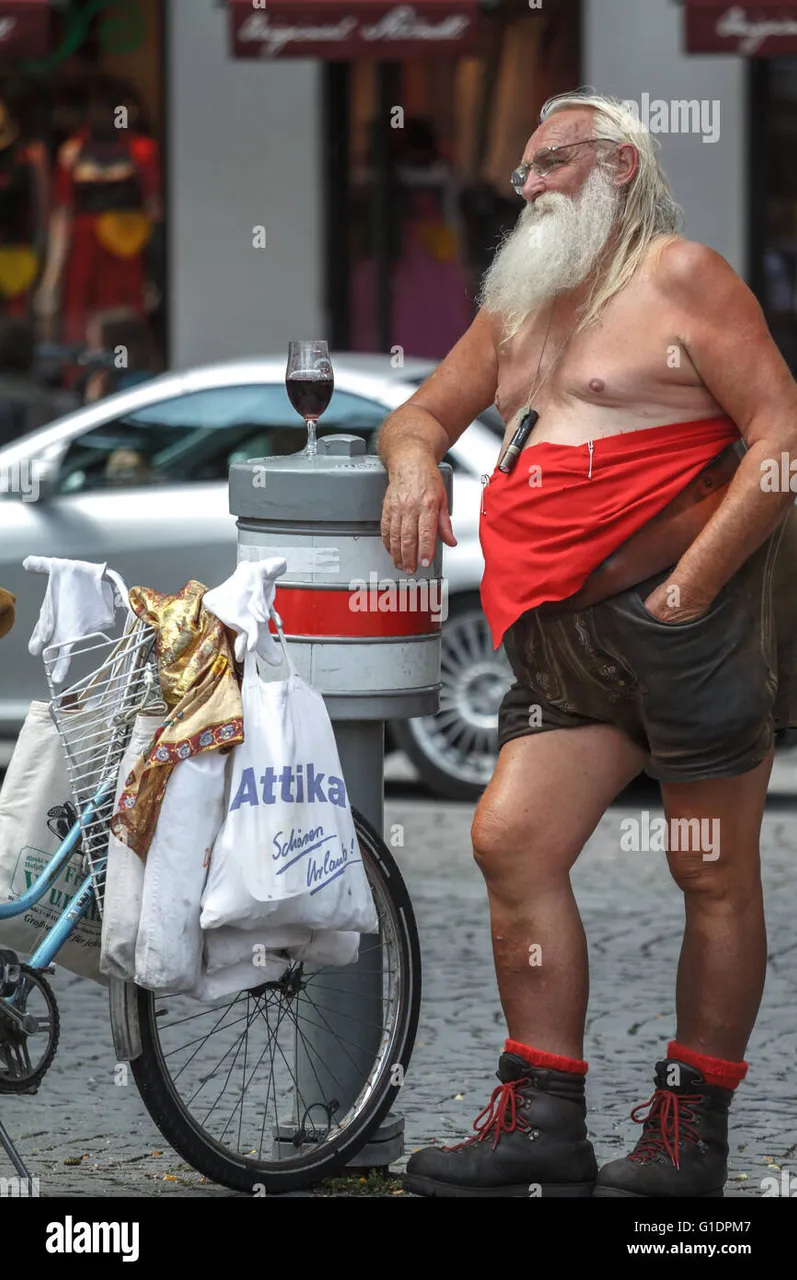 funny-old-man-summary-dressed-in-leather-pants-drink-a-glass-of-beer-G1DPM7.jpg