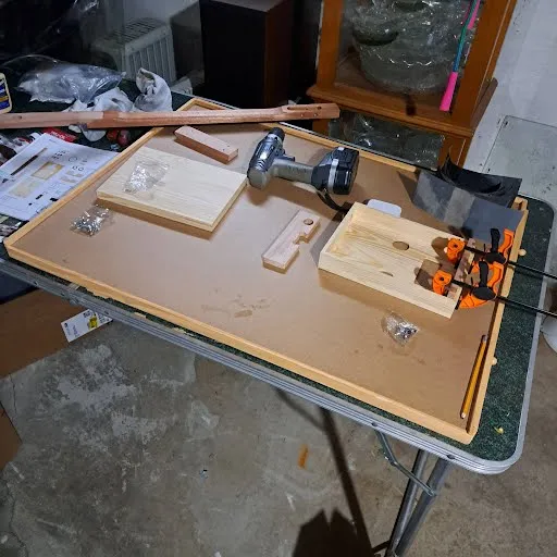 Gluing the supports into the box.