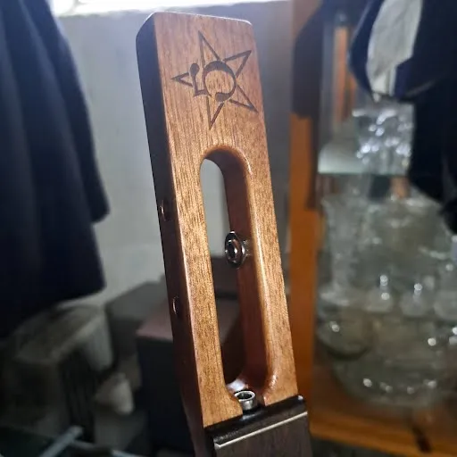 You can see the truss rod peaking out from the bottom. Those tuner grommets were a hassle to get in too.