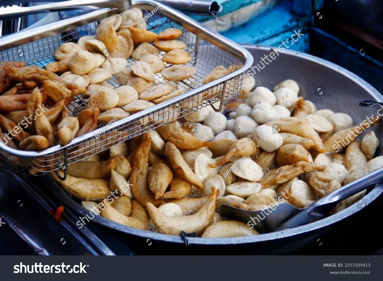 stock-photo-photo-of-freshly-cooked-filipino-street-food-called-fishballs-and-kikiam-2257205413.jpg