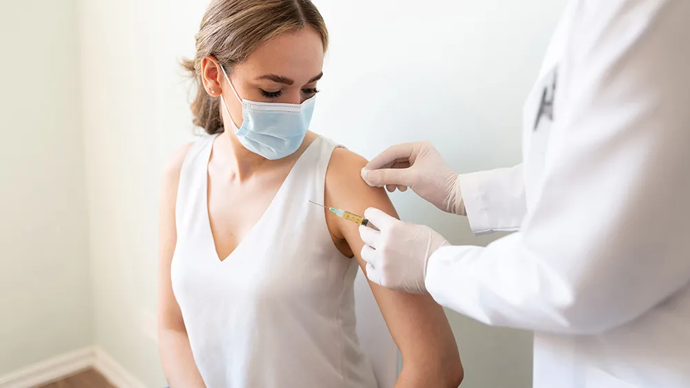 Covid-19-Coronavirus-Doctor-Vacine-Shot-Syringe.jpg