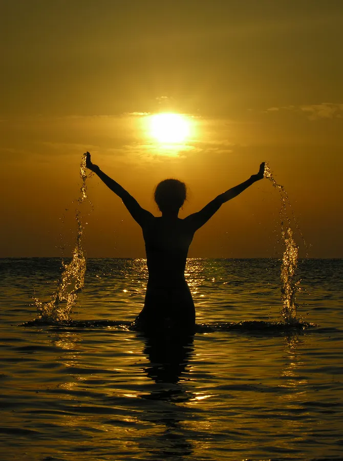 bigstock-Woman-At-Sunrise-With-Drops-Of-433176.jpg