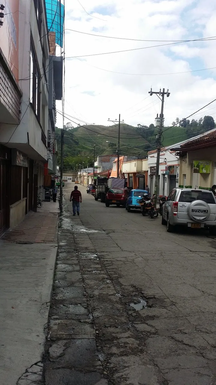 8 - I head to work down cobbled streets Libano Tolima always has mountain views no matter the direction.jpg