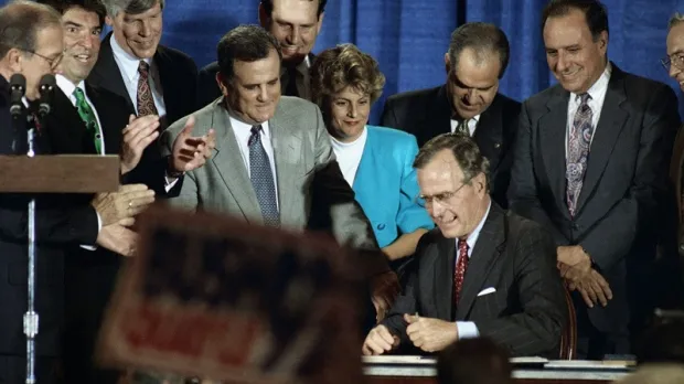 George Bush signs the Cuban Democracy Act
