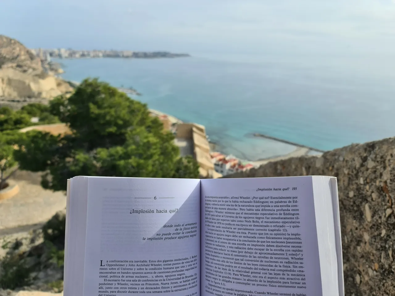 Views from castle of Santa Barbara to the Postiguet beach at my favorite spot for reading close to a wall.