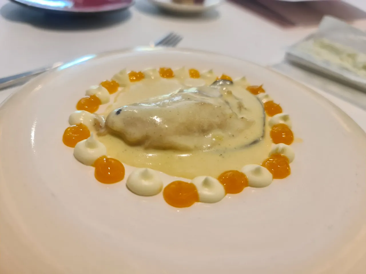 Oyster with cured yolk and sour cream (Fourth main course) (2).
