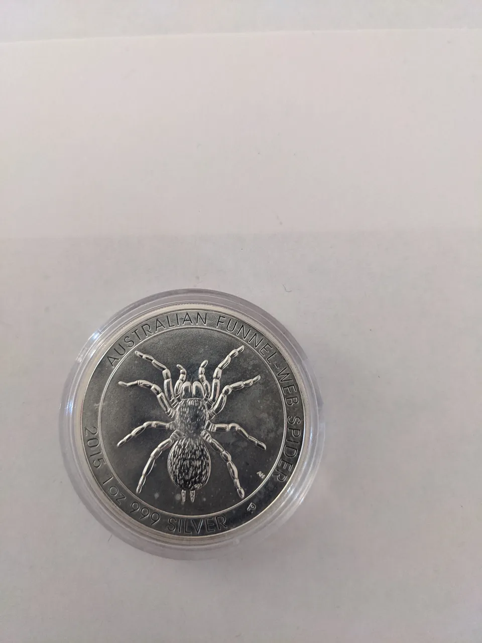 Front 1oz Funnel Web Spider 2015 Silver Coin.jpg
