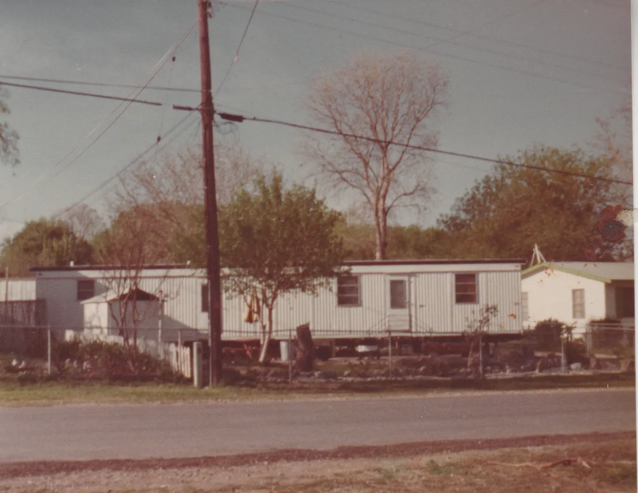 1976 - Moving to San Antonio, might be 1975, but it says 1976 on the back of one of these 4 photos, 4pics-1.png