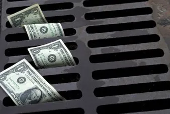 Dollar Bills in Drain