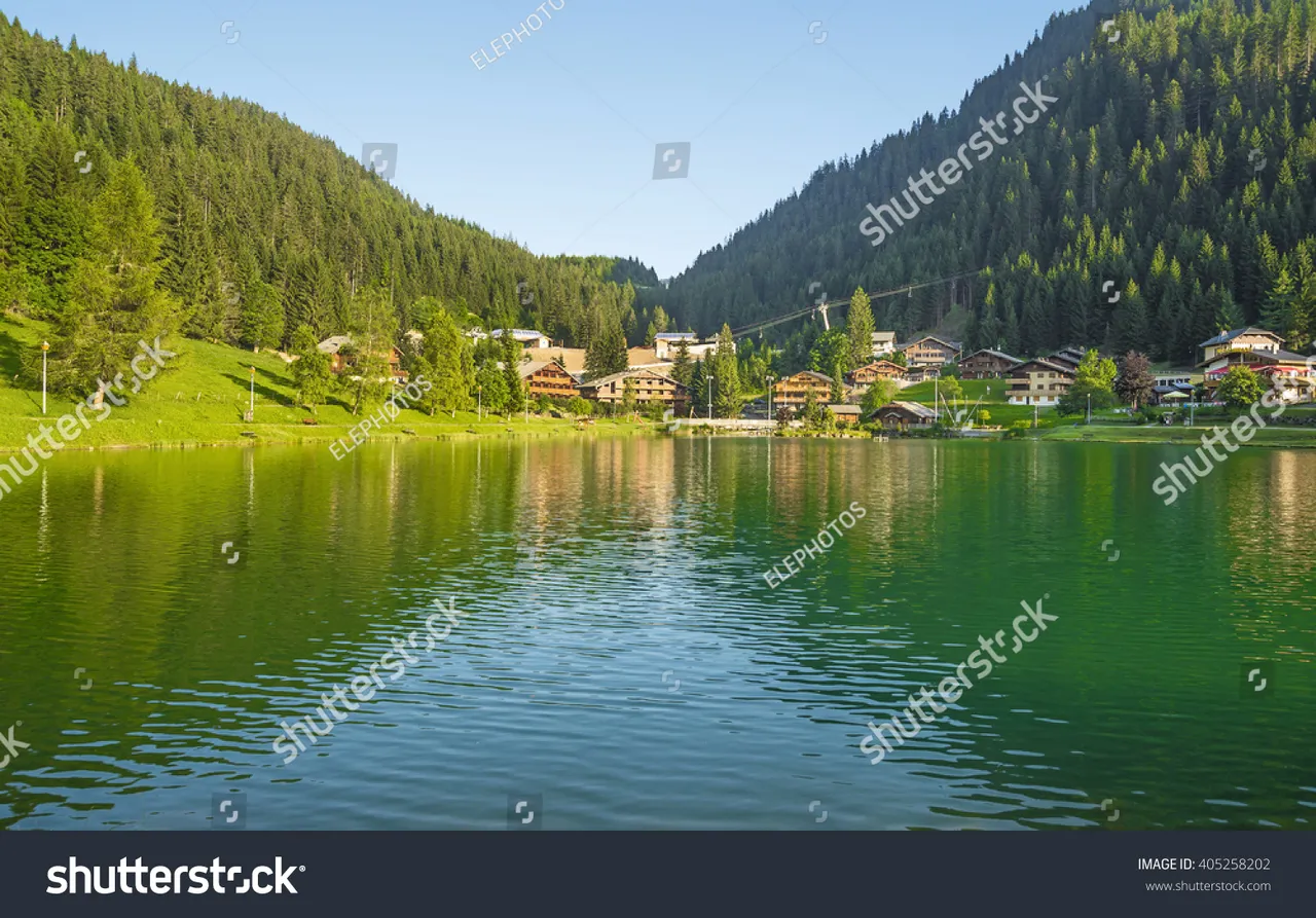 stock-photo-chatel-france-july-countryside-landscape-in-the-french-alps-mountains-summer-evening-in-405258202.jpg