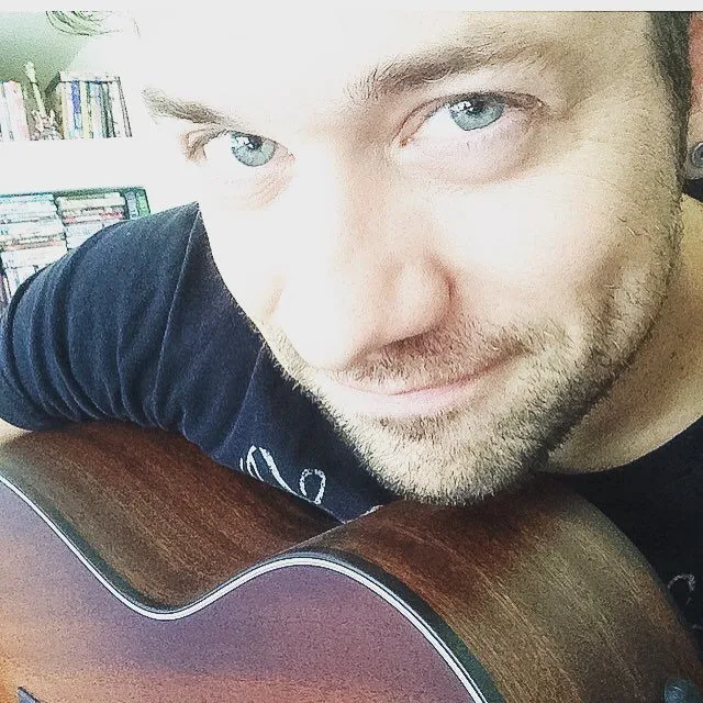 Blue Eyes and Baritone Acoustic Guitars