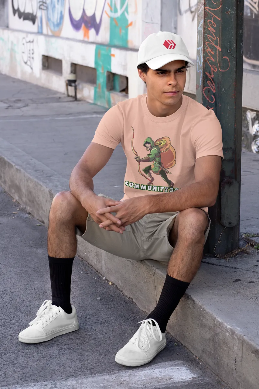 t-shirt-mockup-featuring-a-young-man-wearing-a-dad-hat-in-an-urban-setting-31166.png