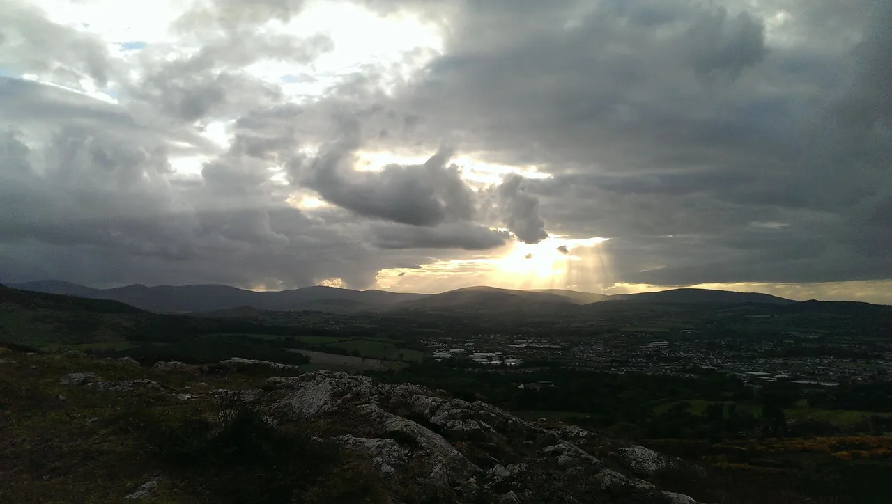 light beams in black clouds.jpg