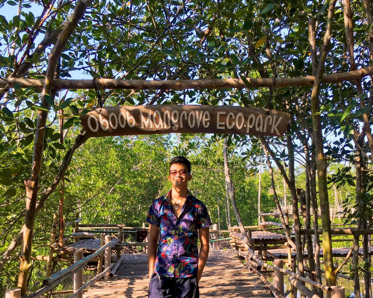 Excuse my smug face as I pose under the wooden banner of Oboob Mangrove Eco Park