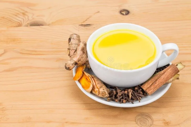 healthy-turmeric-milk-tea-ginger-cinnamon-cloves-black-p-aromatic-roots-pepper-offers-many-wellness-health-benefits-65515233.jpg