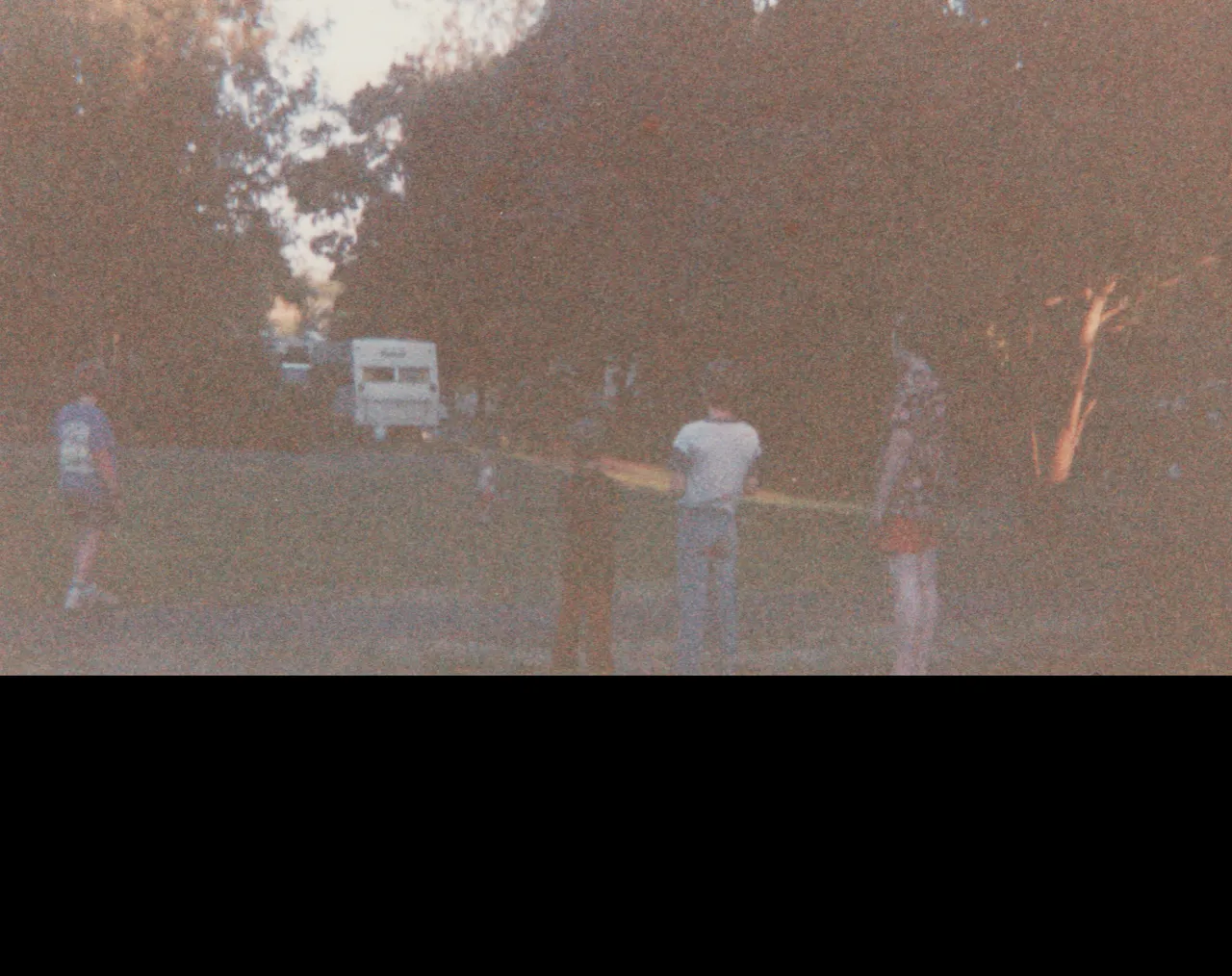 1991-08 - Camping - Joey, Rick, Crystal, Katie, mom, dad, others, tent, picnic table, field, food, playing, includes maybe Sunday or weekend-6.png